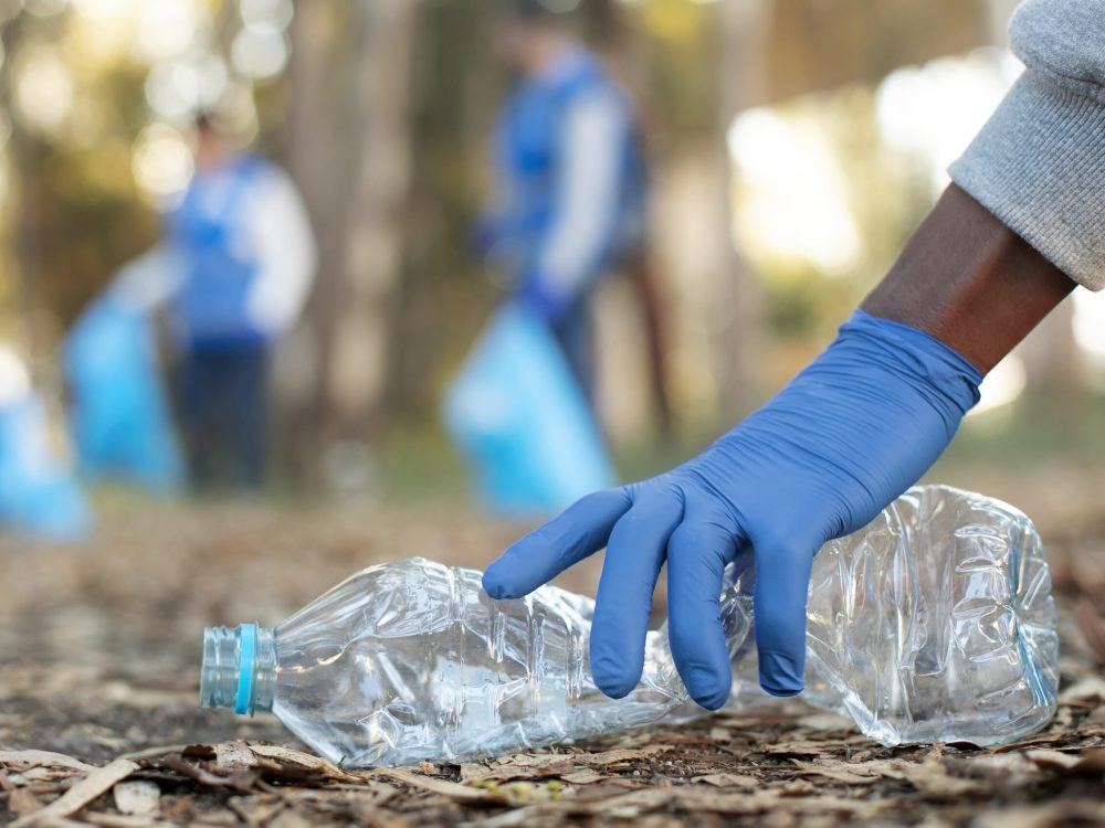 close-up-hand-holding-plastic-bottle close-up-hand-holding-plastic-bottle